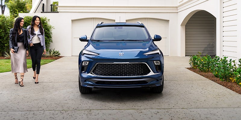 Blue Buick Encore GX parked in driveway