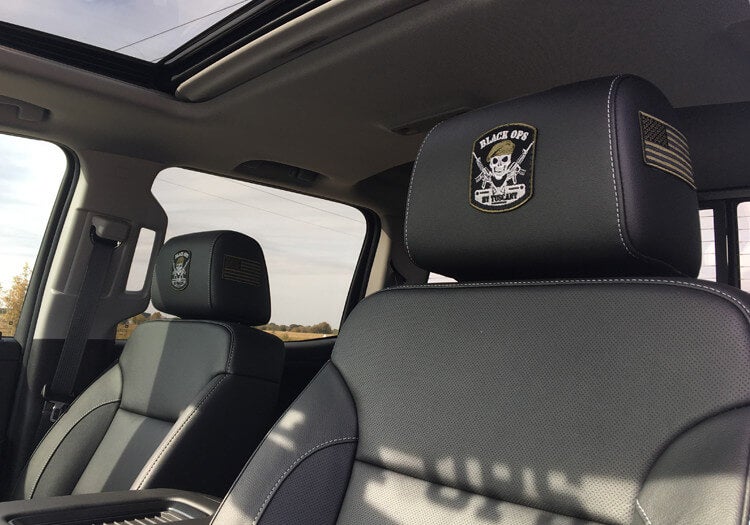 Tuscany Custom black Leather Seating Package with logo on headrest